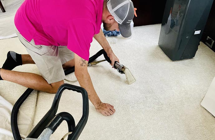 Cleaning the floor of a yacht boat with professional equipment