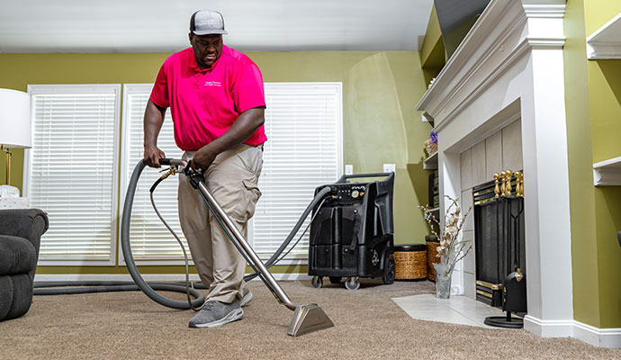 professional man carpet cleaning service